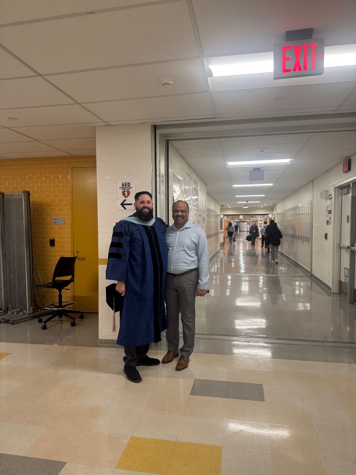 Dr. López in doctoral regalia