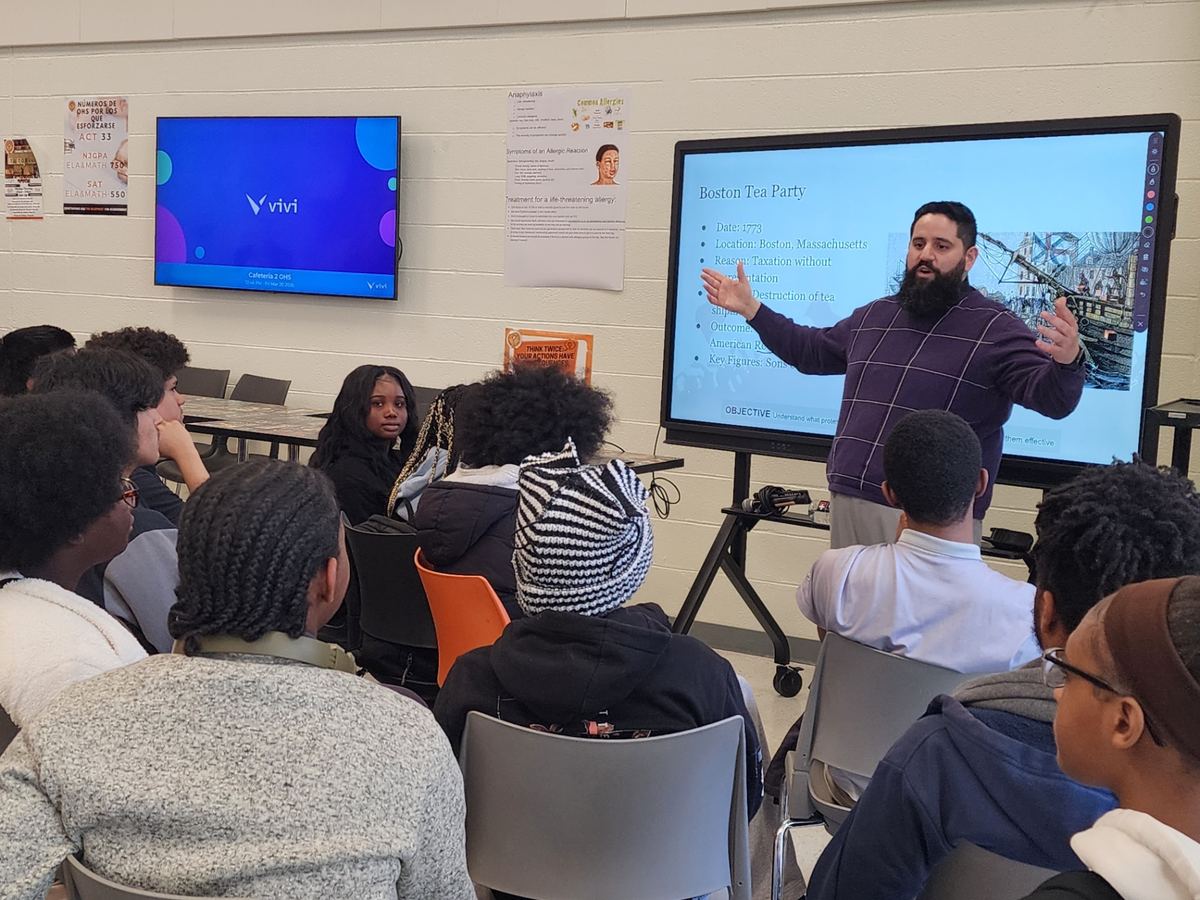 Dr. López leading a classroom discussion